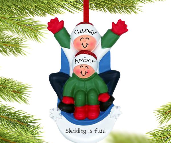 Sledding Couple Ornament